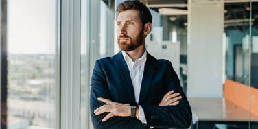 serious businessman considering his professional identity