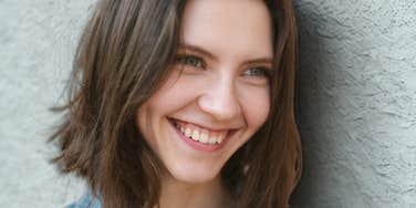 Woman is much happier.