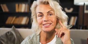 kind older woman smiling happily