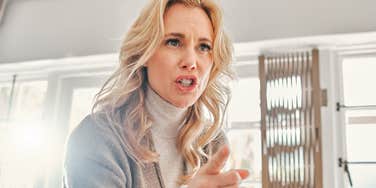 angry mother scolding her adult children