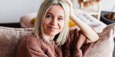 woman relaxing and chilling out on her couch