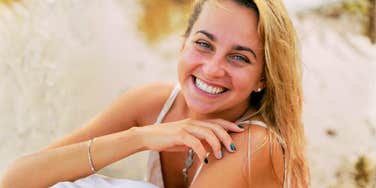 Calm content person enjoying a peaceful moment showing the art of being a satisfied person and the habits of people genuinely satisfied with their lives.