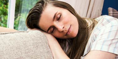 person taking a short nap, illustrating the science-backed reasons regular naps boost memory, focus, and intelligence