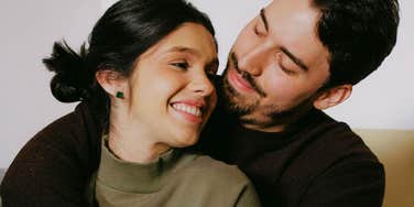 couple holding steady connection through a moment of transition, illustrating the simple ways partners adapt to change while staying deeply in love