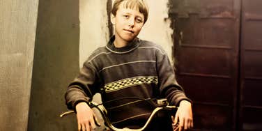 nostalgic Gen X kid riding a bike or doing a simple hands-on task independently, capturing the basic life skills every Gen X person had mastered by the age of twelve.