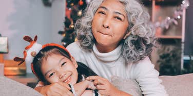 grandma hugging granddaughter on Christmas