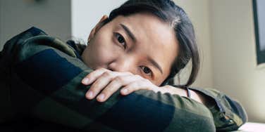 sad worried woman feeling anxious and in survival mode