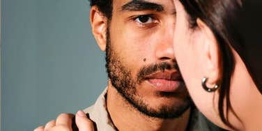 suspicious looking man with bad intentions in relationship