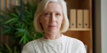 older woman thinking about her finances