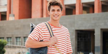 teenage boy smiling at school