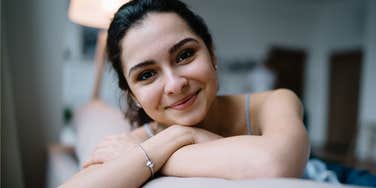 smiling happy woman with a healthy mindset