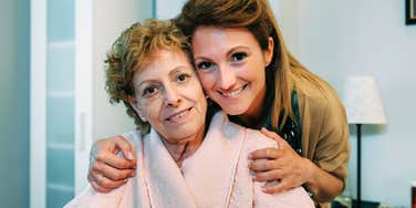 Gentle compassionate person visiting someone in their final days showing the life-affirming lessons a death doula learns while caring for the dying.