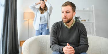 man and woman arguing about cost of wedding