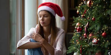 mom who is sad she can't afford holiday traditions