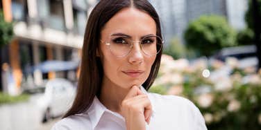 pensive highly intelligent woman with common sense thinking