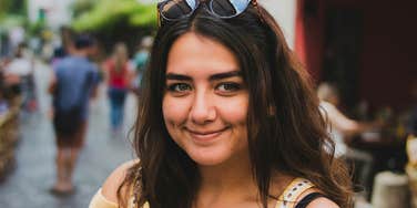 calm gentle woman with steady confident presence, illustrating the quiet signs of genuine inner strength that exist beneath a soft, graceful exterior