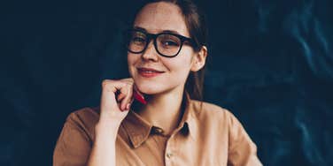 highly intelligent woman with a low ego smiling