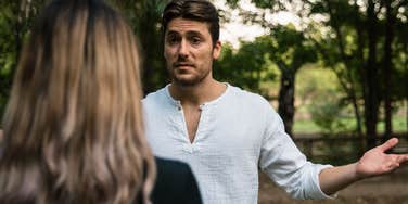 jealous controlling man yelling and angry at partner