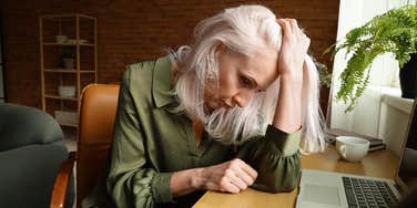 woman who has stopped trying at work for the year