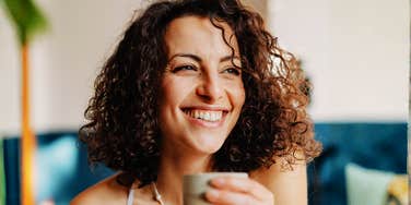 content focused person moving through simple daily routines with ease, illustrating the small autopilot habits happy people rely on that quietly shape a better life