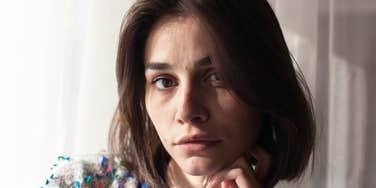 serious young woman thinking about her childhood