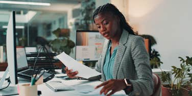 businesswoman working at desk in office