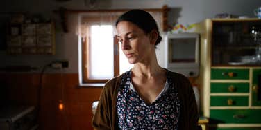 tired hardworking mom in home