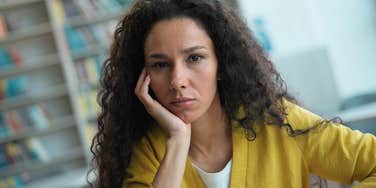 woman overwhelmed after giving too much of herself to others