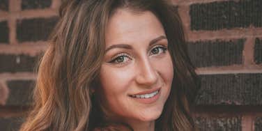 Woman is unshaken and happy.