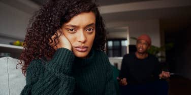 sad wife staying quiet during argument with husband
