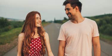 man giving woman princess treatment