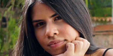 Woman questions if someone is trustworthy.