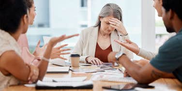 worker who is being pressured into contributing to an office gift