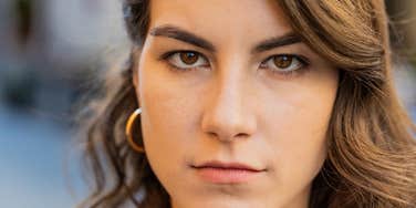 woman with a dark agenda staring menacingly