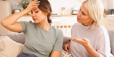 woman explaining to adult child she's cutting her off