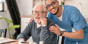 caregiver and his elderly client