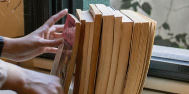 Books are stored cleverly in a space.