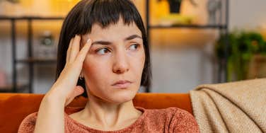 introverted woman looking annoyed