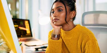 stressed employee thinking about how hard her life is about to become at work