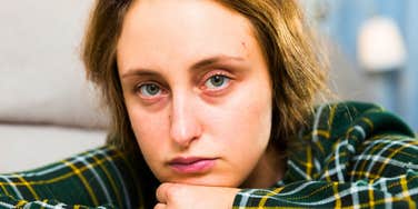 very unhappy woman who hates her life ruminating