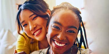 Two women who are amazing at small talk having fun together
