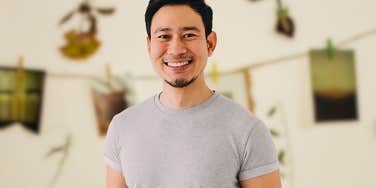 Man who truly cares about others standing in a soft room