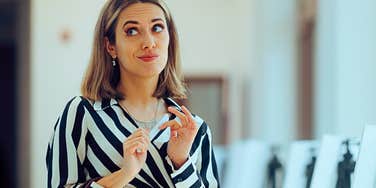 Person who is low quality showing obvious signs like rolling her eyes