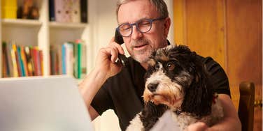 dog with owner working from home