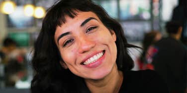 Woman who has a good soul, who is smiling. 