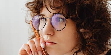 Woman realizes a person thinks they are better than her.