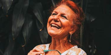 woman laughing trait more attractive physical looks