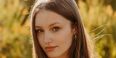 Woman has a soft heart and smart mouth.