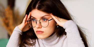 woman mentally exhausted by normal work demands that shouldn’t feel this hard