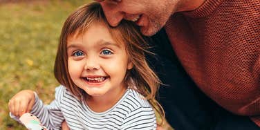 Good parent playing with his child won't say damaging phrases